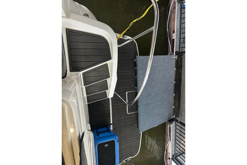 Slide: The Image of 1999 Silverton 352 Motor Yacht swim platform with railing and dock connection. - 39