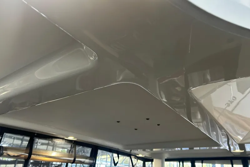 Slide: The Image of Interior ceiling of a 1999 Silverton 352 Motor Yacht, showcasing sleek design and lighting. - 41