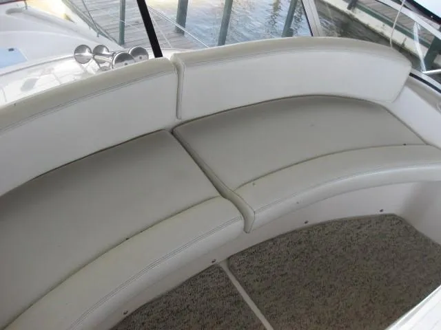 Slide: The Image of 1999 Silverton 352 Motor Yacht docked in a marina, side view. - 6
