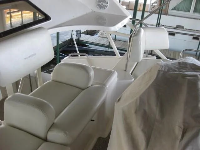 Slide: The Image of Engine compartment of a 1999 Silverton 352 Motor Yacht with visible batteries and wiring. - 7