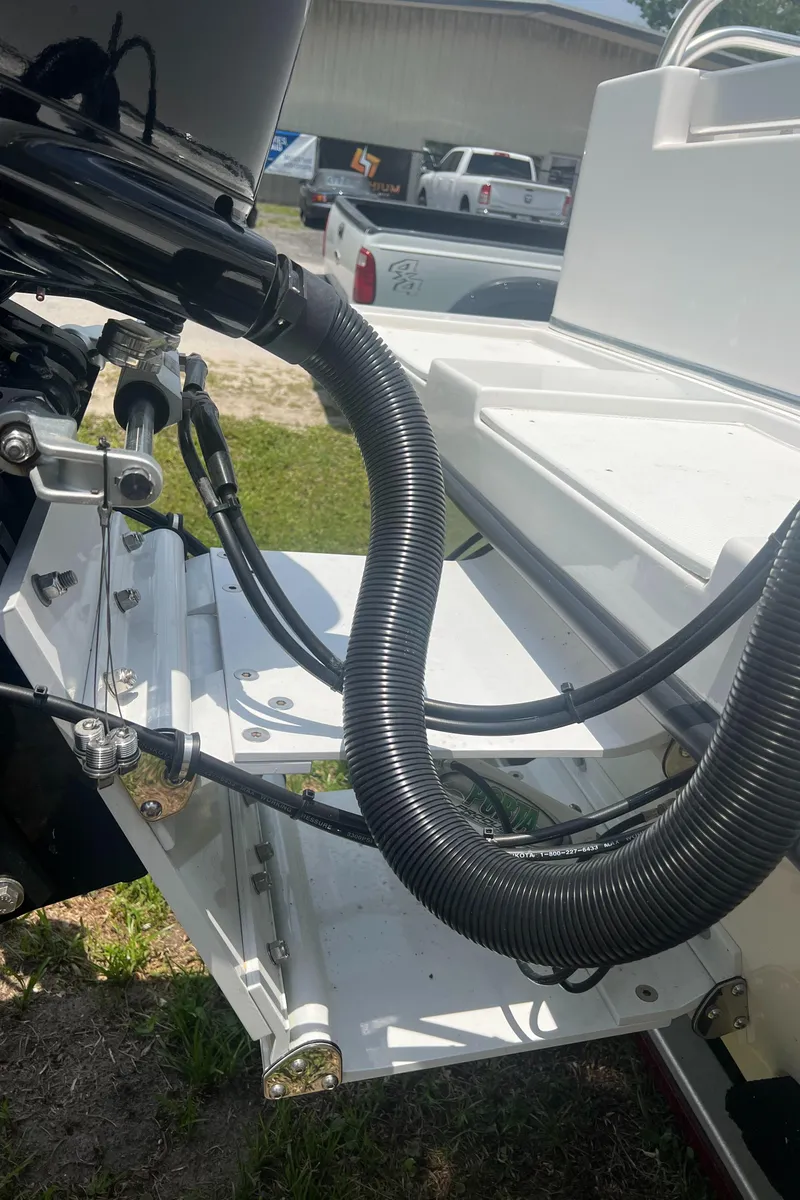 Slide: The Image of Close-up of Mirage Bay Cat 26 boat motor, 2022 model. - 5