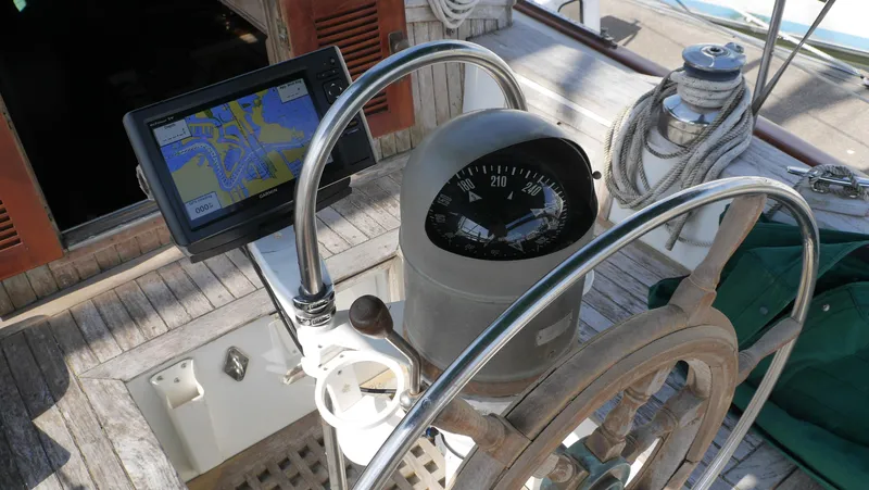 Slide: The Image of Steering wheel and navigation system on a 1979 Tayana 37 sailboat. - 28
