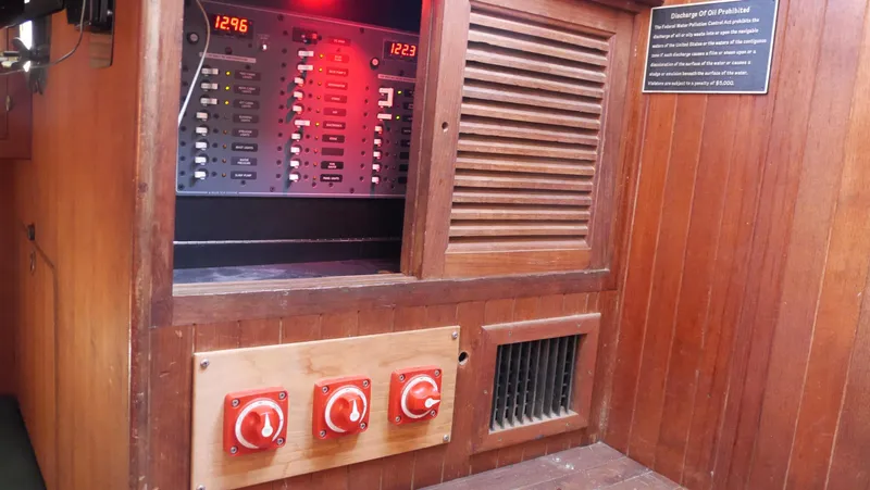 Slide: The Image of Electrical panel and controls inside a 1979 Tayana 37 sailboat. - 23