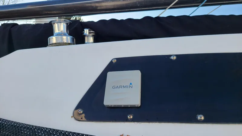 Slide: The Image of Garmin device on 1987 Corsair F-27 #27 sailboat deck, near winch. - 11