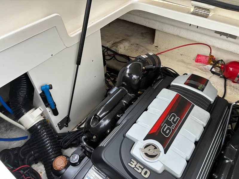 Slide: The Image of Engine compartment of 2021 Sea Ray SDX 290 with 6.2L 350 horsepower engine. - 16