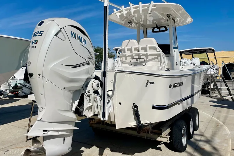 Slide: The Image of 2023 Regulator 26XO boat with Yamaha 425 V8 engine on trailer. - 4