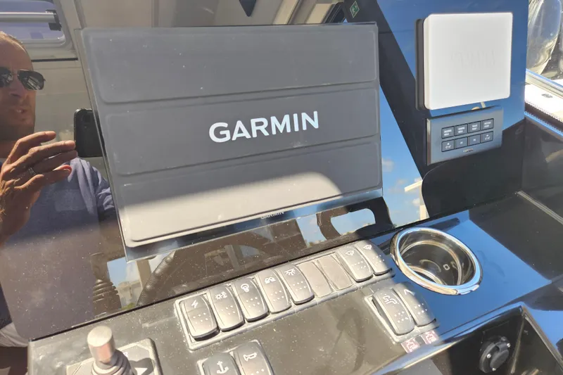 Slide: The Image of Garmin navigation system on 2026 Jeanneau NC 895 Sport Series 2 boat dashboard. - 19