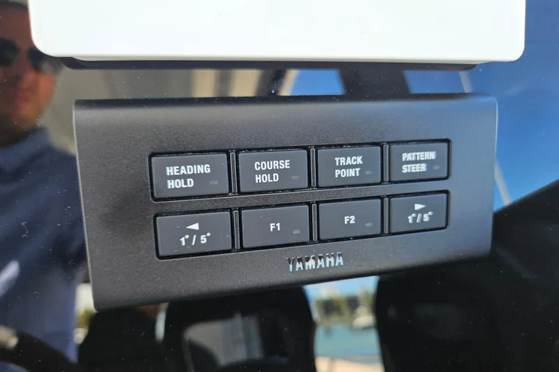 Slide: The Image of Control panel of a 2026 Jeanneau NC 895 Sport Series 2 boat with Yamaha buttons. - 20