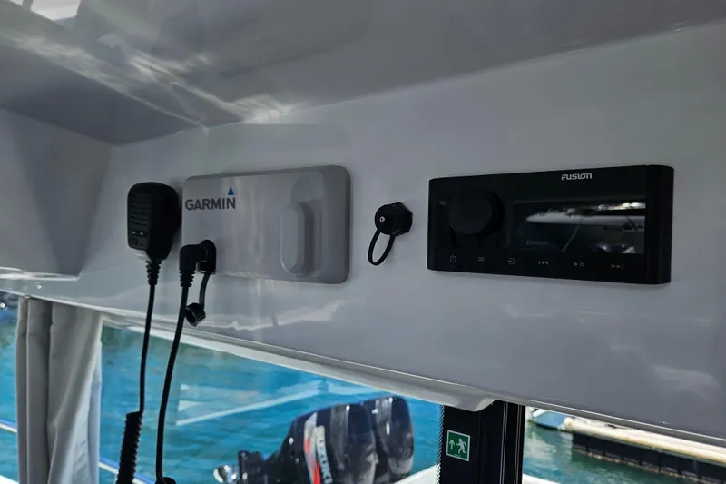 Slide: The Image of 2026 Jeanneau NC 895 Sport Series 2 interior with Garmin and Fusion electronics. - 21