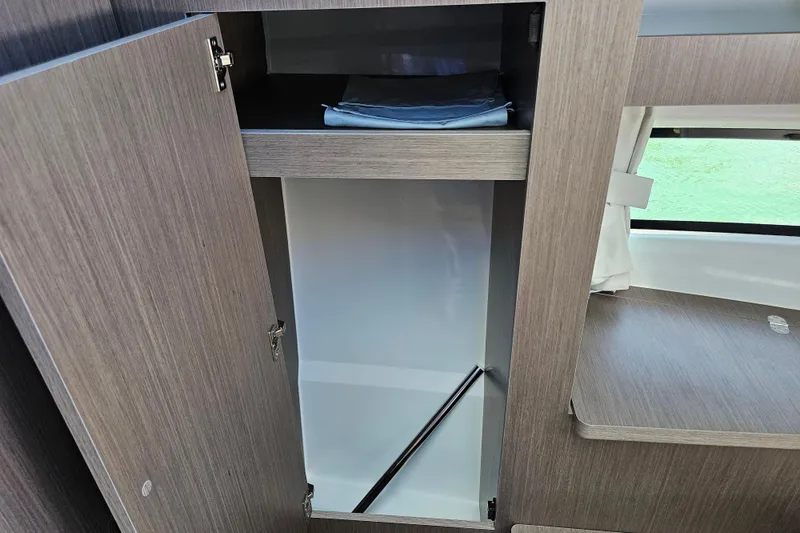 Slide: The Image of Interior storage cabinet in 2026 Jeanneau NC 895 Sport Series 2 boat. - 28
