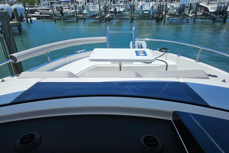 Slide: The Image of 2026 Jeanneau NC 895 Sport Series 2 boat docked at marina, featuring spacious deck. - 33