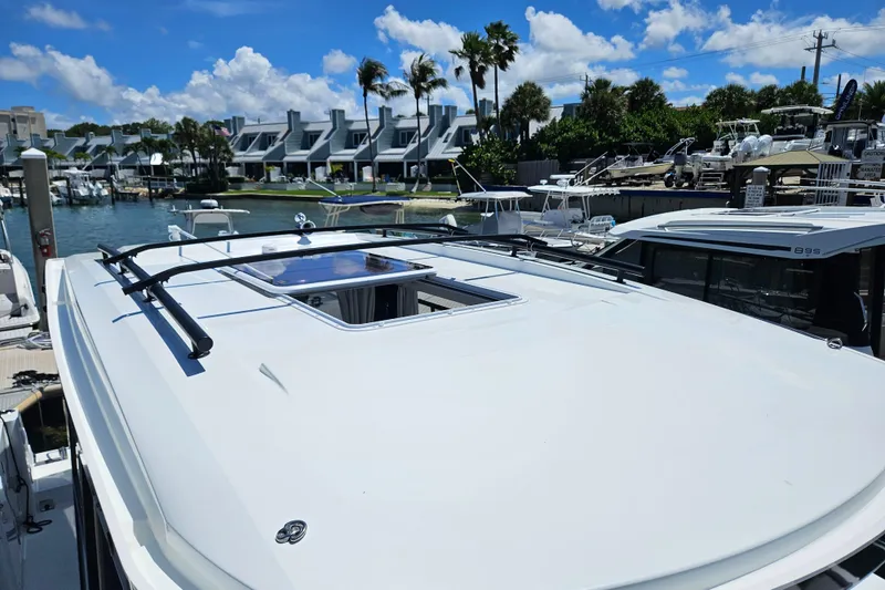 Slide: The Image of 2026 Jeanneau NC 895 Sport Series 2 docked, showcasing sleek design and modern features. - 35