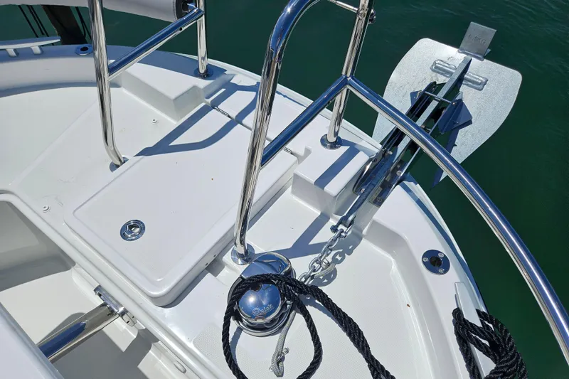 Slide: The Image of Bow of 2026 Jeanneau NC 895 Sport Series 2 with anchor and railing. - 36