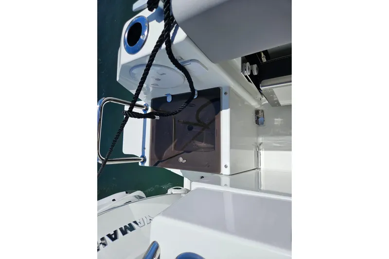 Slide: The Image of 2026 Jeanneau NC 895 Sport Series 2 boat deck with storage compartment and railing. - 39