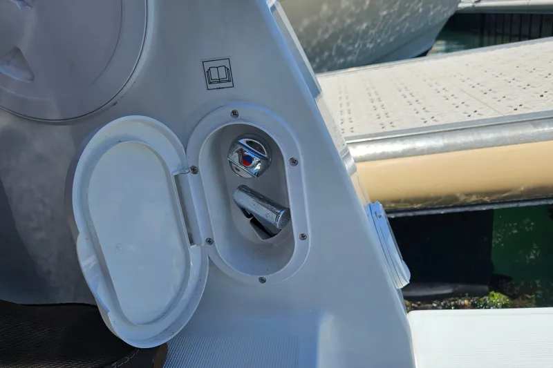 Slide: The Image of Fuel cap on a 2026 Jeanneau NC 895 Sport Series 2 boat at dock. - 42