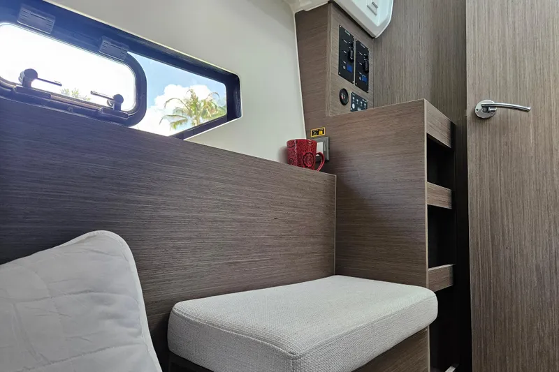 Slide: The Image of Interior of 2026 Jeanneau NC 895 Sport Series 2, featuring modern wood finish and seating. - 48
