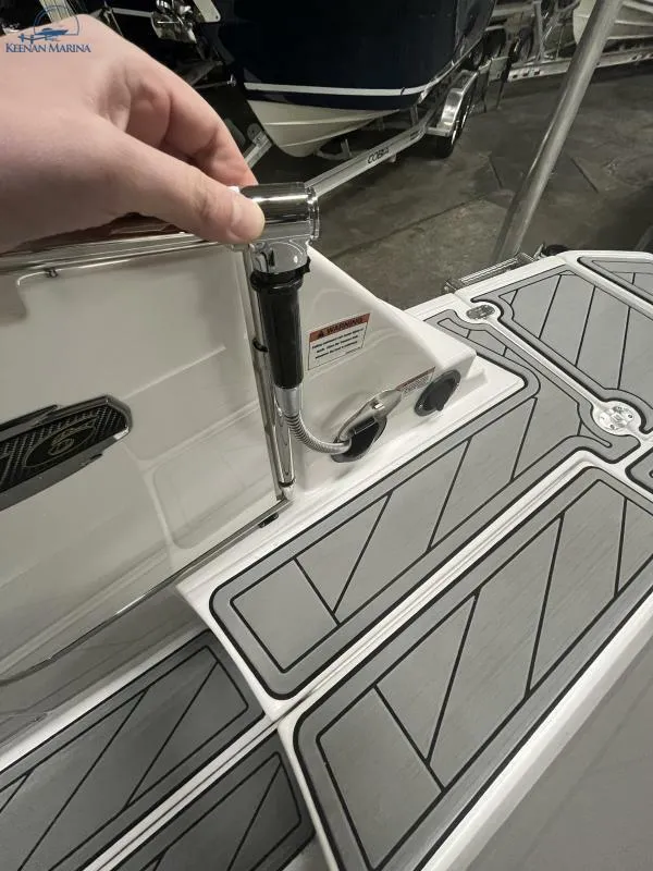 Slide: The Image of 2024 Monterey M6 boat deck with sleek gray and white design details. - 17