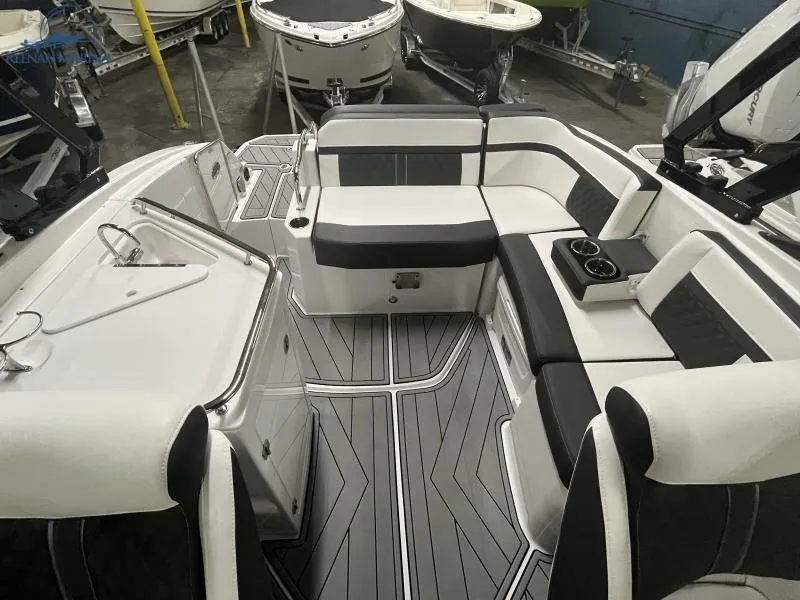 Slide: The Image of 2024 Monterey M6 boat interior with sleek seating and modern design. - 6