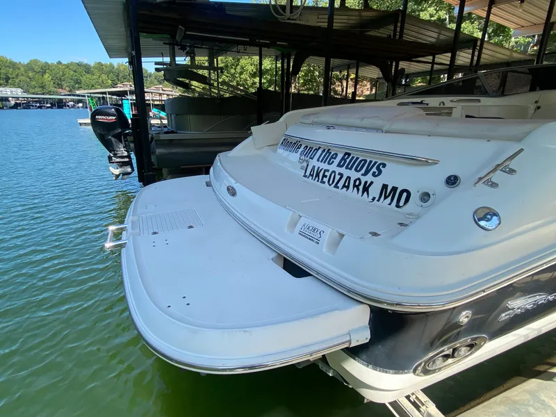 Slide: The Image of Chaparral 280 SSi boat docked at Lake Ozark, MO, rear view, 2000 model. - 17