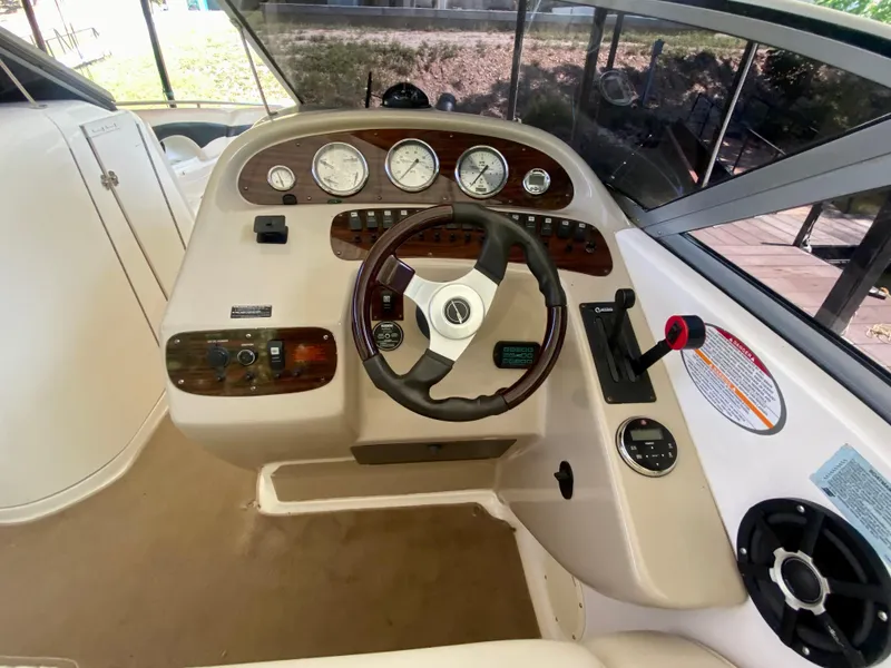 Slide: The Image of Cockpit of 2000 Chaparral 280 SSi boat with steering wheel and instrument panel. - 28