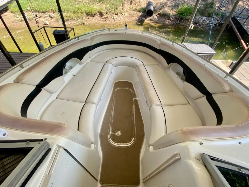 Slide: The Image of Bow seating area of 2000 Chaparral 280 SSi boat with beige upholstery. - 32
