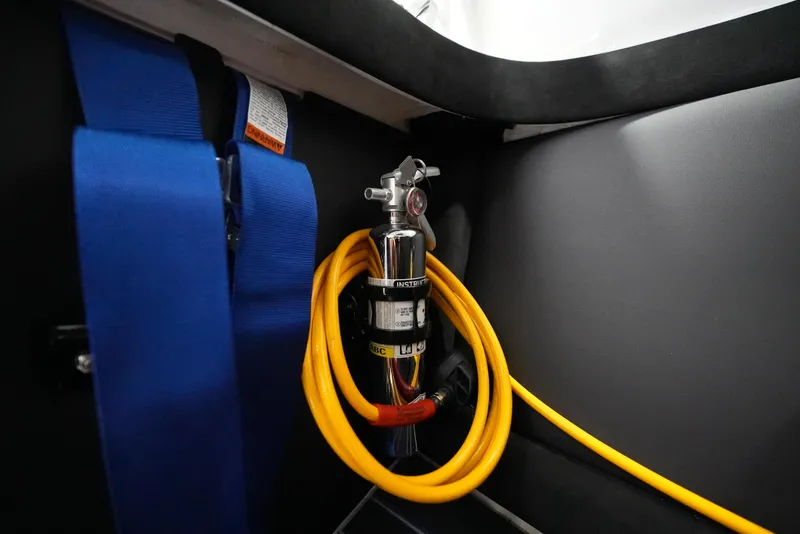 Slide: The Image of Safety equipment and wiring inside a 2007 Mystic Powerboats 50' model. - 19