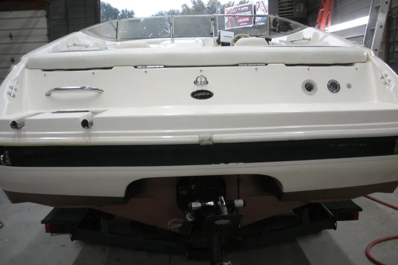 Slide: The Image of 1999 Rinker 232 Captiva Cuddy boat radio and speaker system detail. - 10