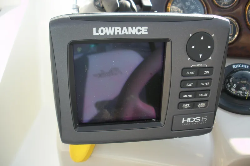 Slide: The Image of Lowrance HDS5 marine GPS on 1999 Rinker 232 Captiva Cuddy dashboard. - 11