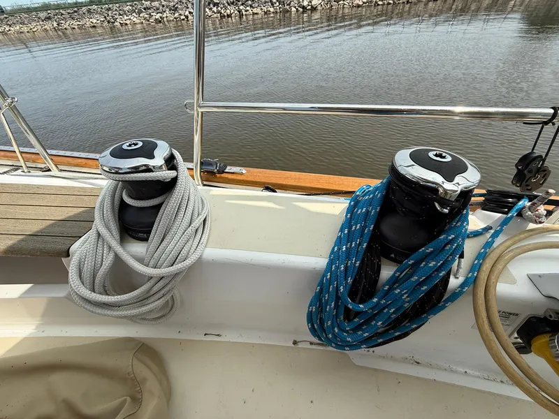 Slide: The Image of Sailboat deck with winches and ropes, Tartan 4000, 2012 model, near calm water. - 18