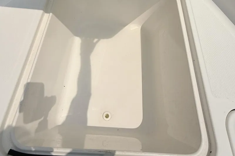 Slide: The Image of Storage compartment on a 2005 Sea Fox 245 Bay Fisher boat. - 16