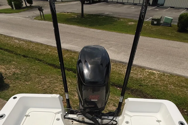 Slide: The Image of 2005 Sea Fox 245 Bay Fisher boat with outboard motor and dual power poles. - 6