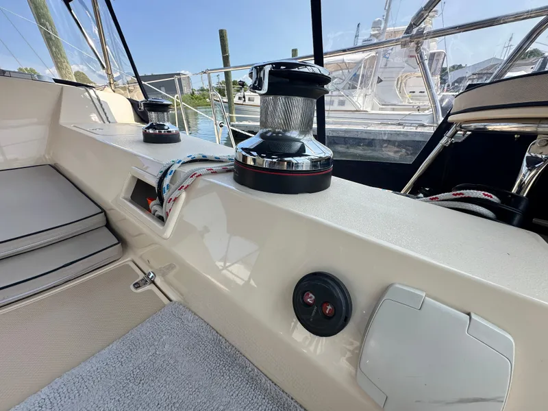 Slide: The Image of Cockpit view of 2021 Island Packet 439 sailboat with winch and ropes. - 19