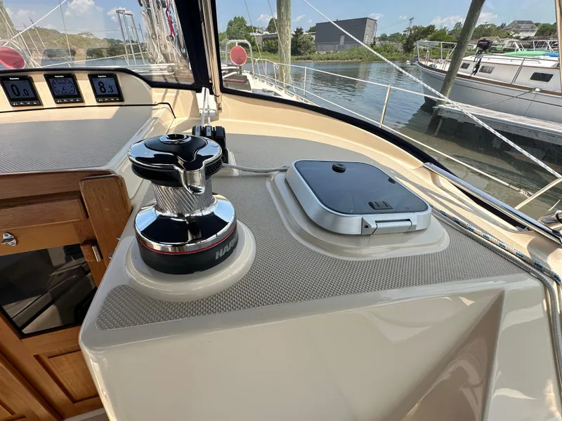 Slide: The Image of Cockpit of 2021 Island Packet 439 sailboat with winch and navigation instruments. - 26