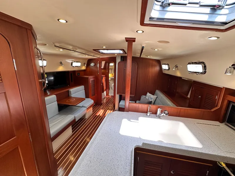 Slide: The Image of Luxurious interior of 2021 Island Packet 439 yacht with wood finishes and modern amenities. - 30