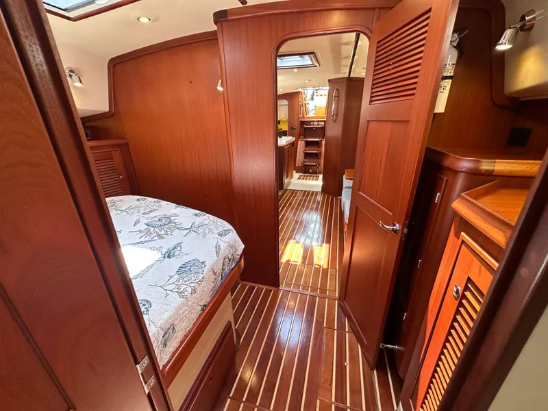 Slide: The Image of Luxurious interior of 2021 Island Packet 439 yacht with wooden finishes and cozy cabin. - 44