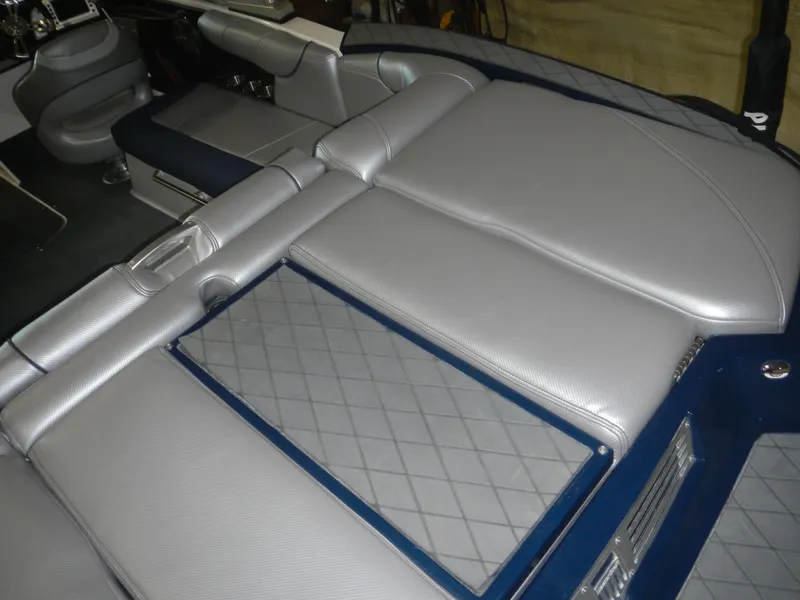 Slide: The Image of 2013 MasterCraft X30 interior with silver upholstery and diamond-patterned detailing. - 10