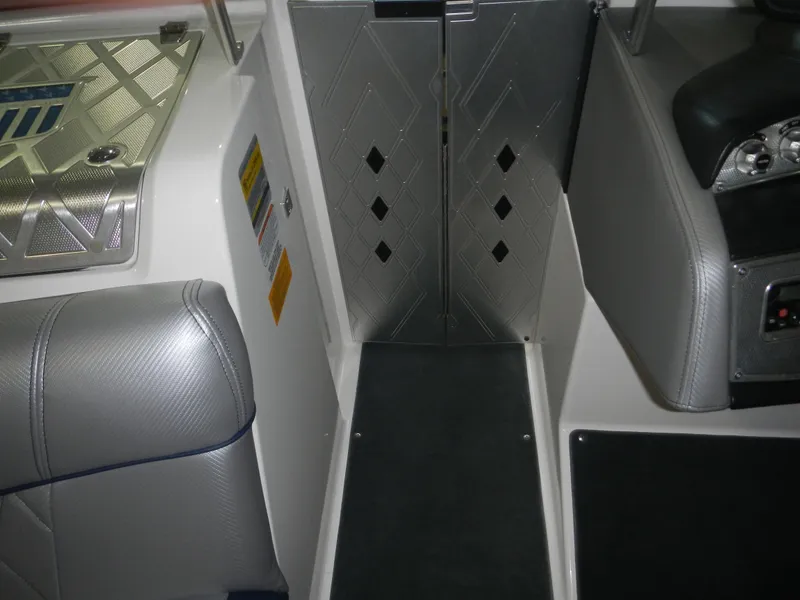 Slide: The Image of Interior of 2013 MasterCraft X30 boat, featuring sleek seating and modern design elements. - 25