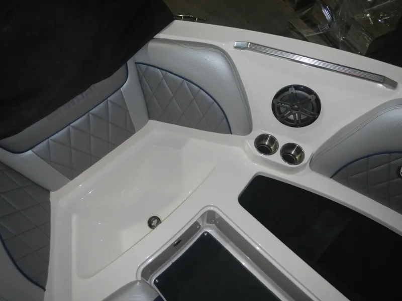 Slide: The Image of Interior of 2013 MasterCraft X30 boat with quilted seating and speaker system. - 27