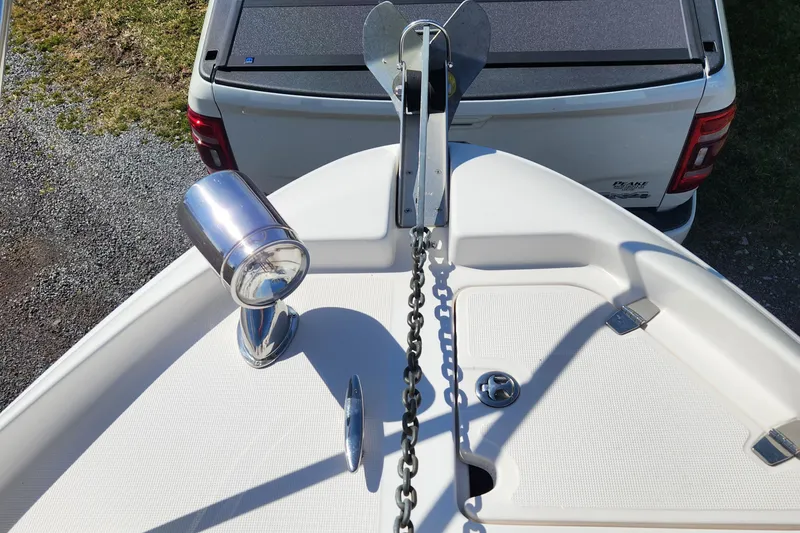 Slide: The Image of Bow of 2005 Regal Commodore 2765 with anchor and spotlight, viewed from above. - 15