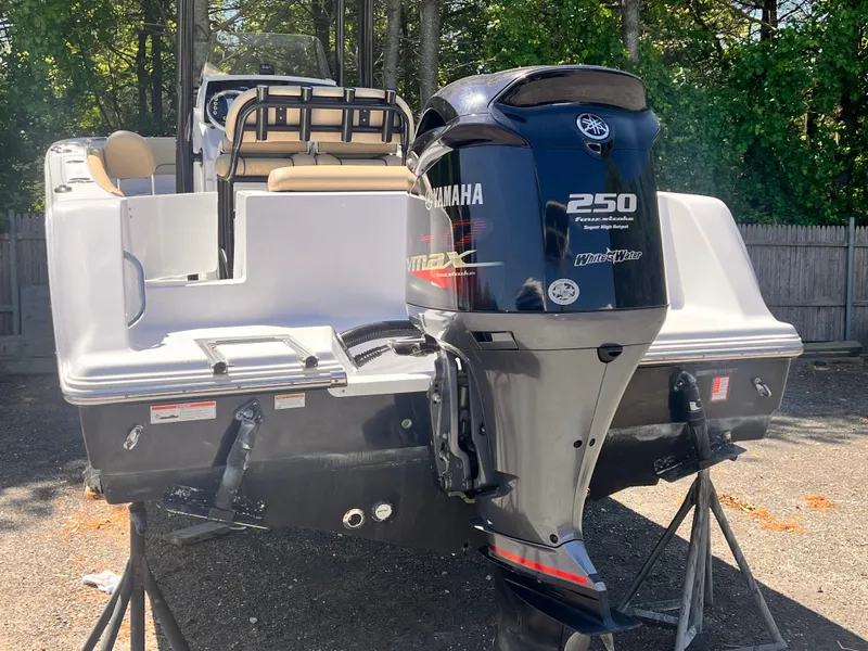 Slide: The Image of 2018 Sportsman Open 232 Center Console boat with Yamaha 250 outboard motor. - 8