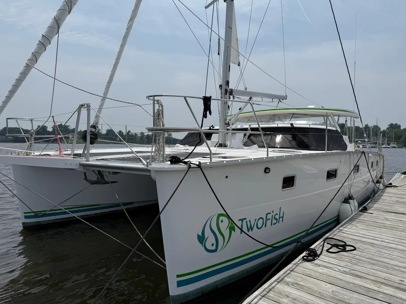 The Image of 2021 Antares 44GS catamaran "TwoFish" docked at marina, side view. - 1