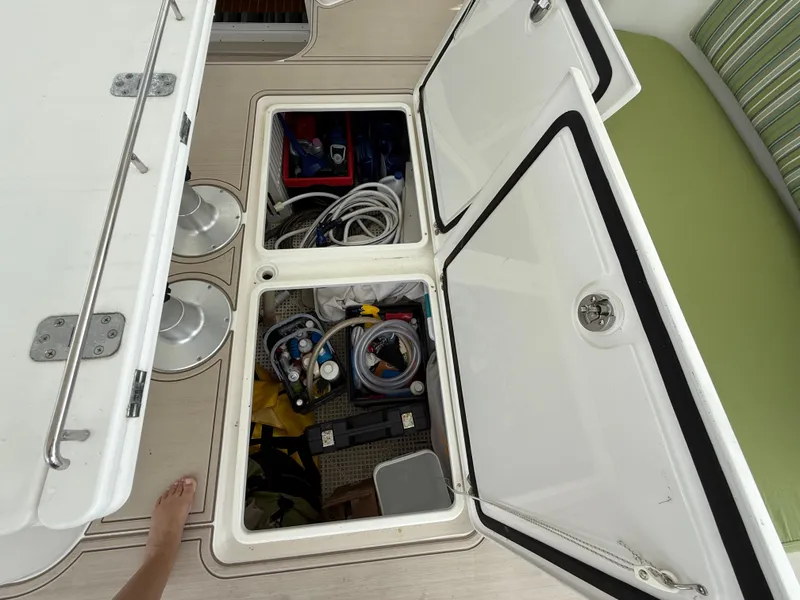 Slide: The Image of Open storage compartments on Antares 44GS yacht, showcasing organized equipment and supplies. - 12