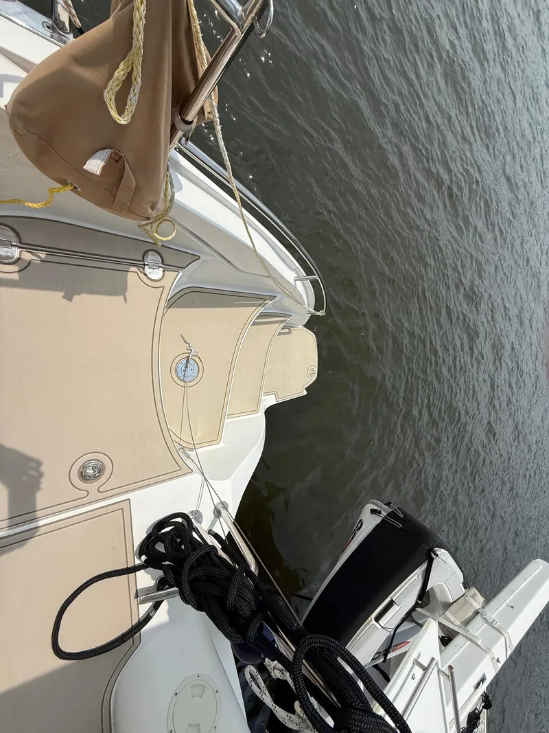 Slide: The Image of Deck view of 2021 Antares 44GS yacht on water. - 18