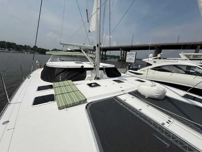 Slide: The Image of 2021 Antares 44GS yacht on water, featuring spacious deck and modern design. - 29