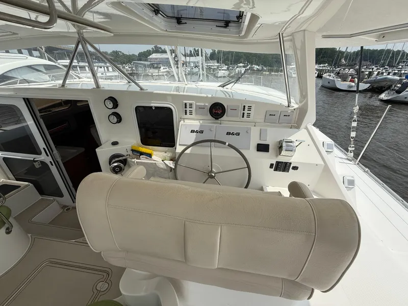 Slide: The Image of Helm of 2021 Antares 44GS yacht with steering wheel and navigation instruments. - 33