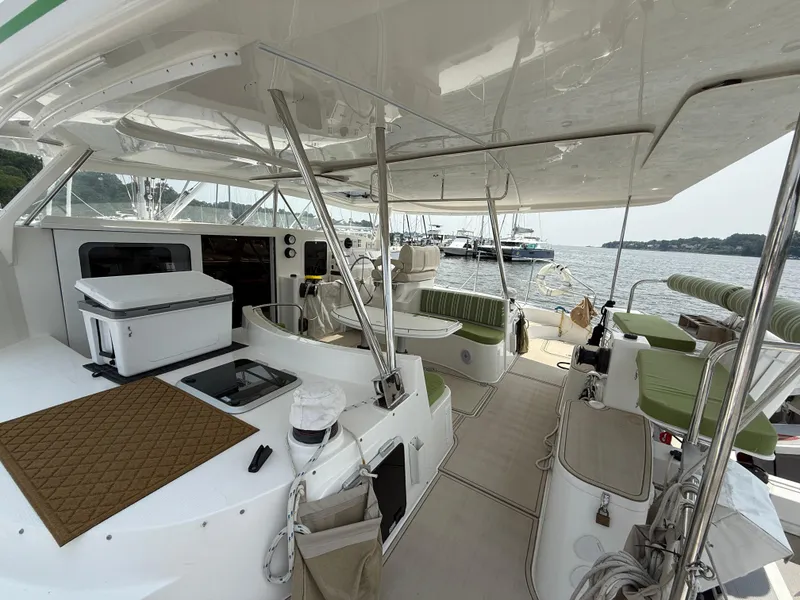 Slide: The Image of Spacious deck of 2021 Antares 44GS yacht with seating and ocean view. - 42