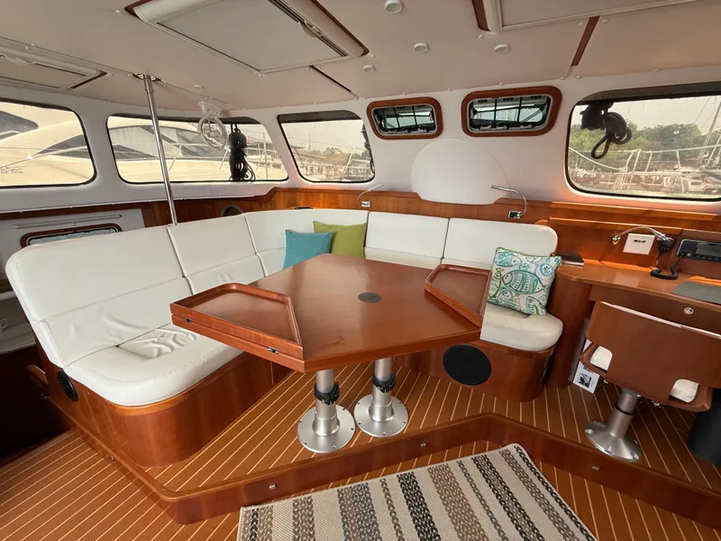 Slide: The Image of Luxurious interior of 2021 Antares 44GS yacht with elegant wood and white seating. - 45