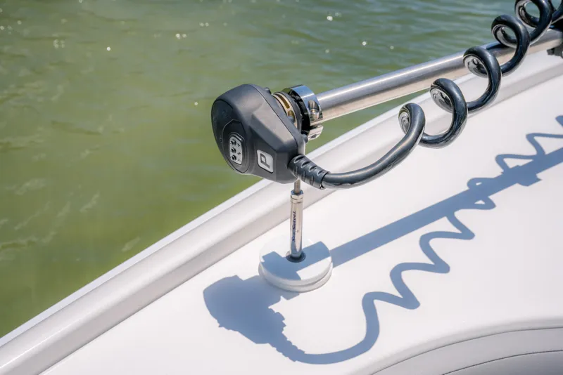 Slide: The Image of 2024 Contender 26 Bay boat with mounted trolling motor detail. - 18