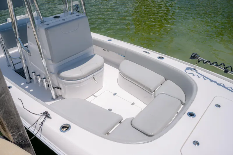 Slide: The Image of 2024 Contender 26 Bay boat interior with cushioned seating and sleek design. - 21
