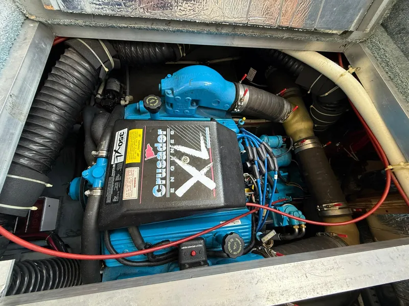 Slide: The Image of Engine compartment of a 1996 Carver 325 Aft Cabin with Crusader XL engine. - 38